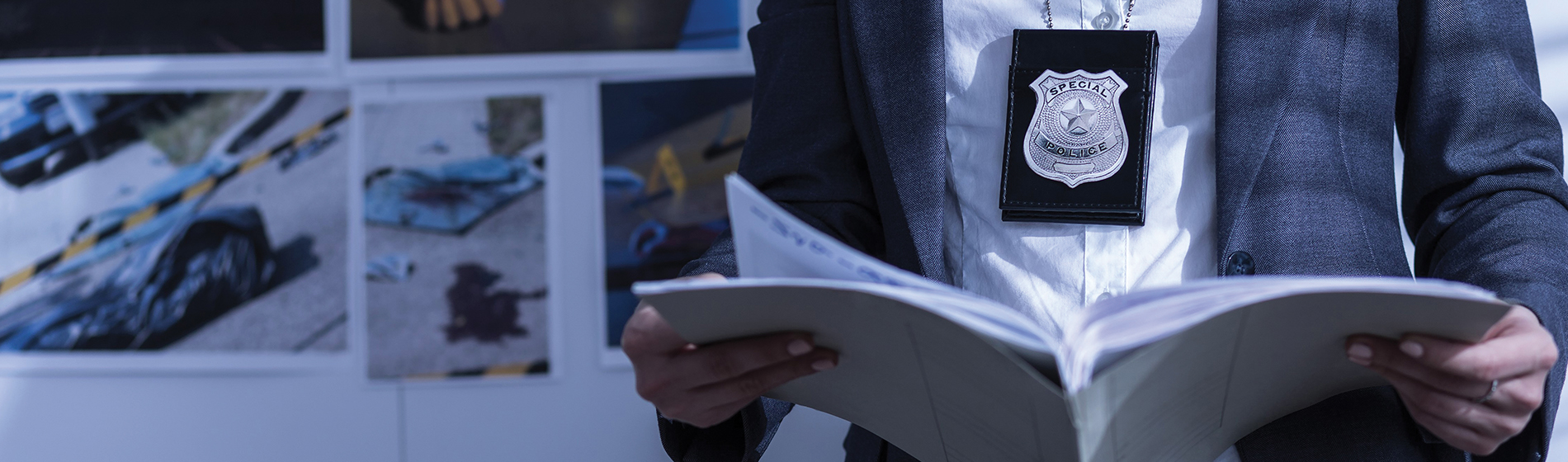 A special agent reading a report